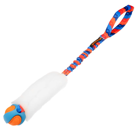Draleke med hvitt saueskinn, giftfri ball og polstret oransje håndtak med strikk.