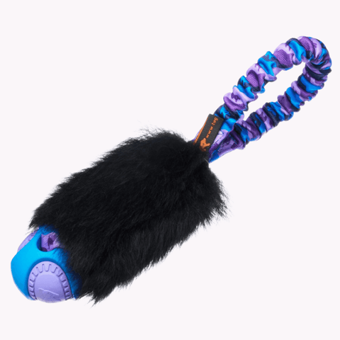 Leke i lommestørrelse med giftfri ball, sort saueskkinn og lilla strikkhåndtak
